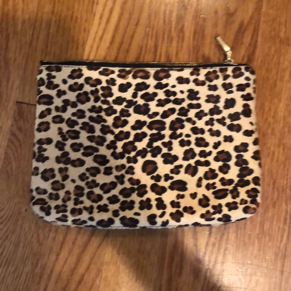 Calf skin, cheetah clutch.